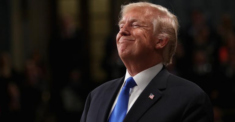 Trump-smiling-GettyImages-912436198.jpg