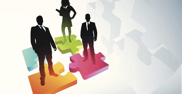business people puzzle pieces