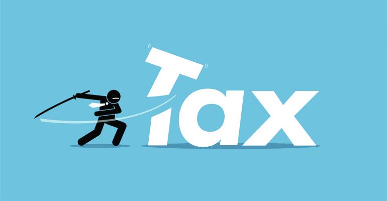 businessman cutting taxes