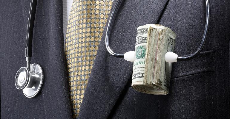 businessman-stethoscope-money.jpg