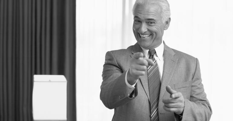 cheesy salesman pointing black and white