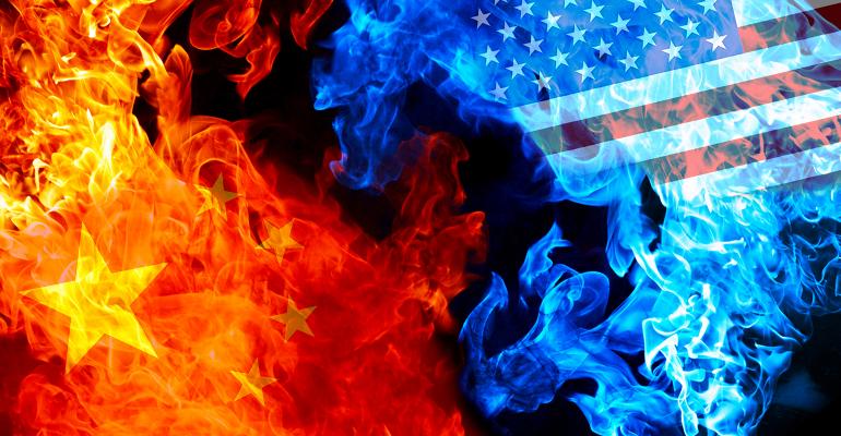 China US flags fire