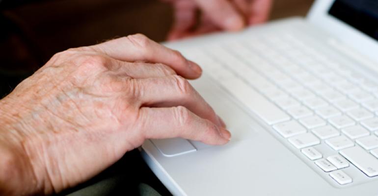 elderly hands laptop
