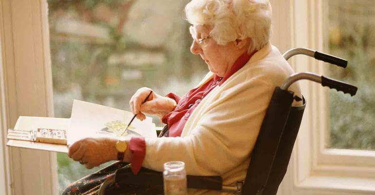 elderly-woman-painting-wheelchair.jpg