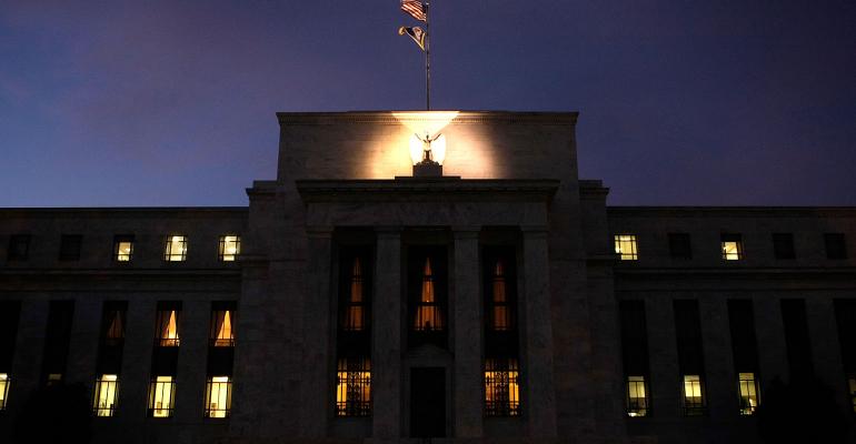 federal reserve building at night