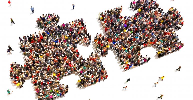 merge-puzzle piece made of people-GettyImages-473511946.jpg