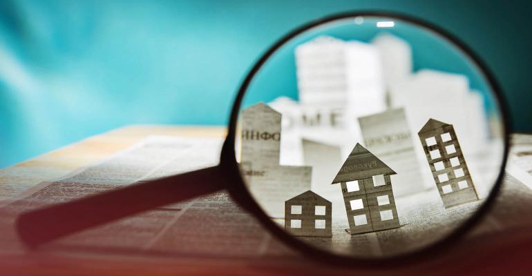 mortgage-CRE under magnifying glass-ts.jpg