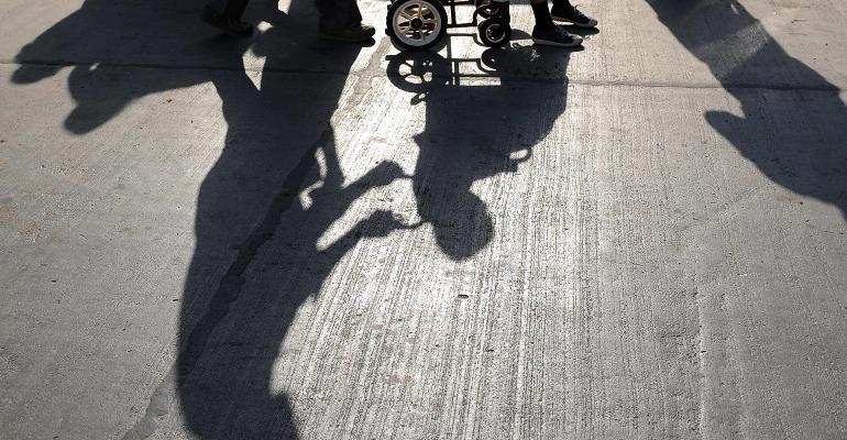 pushing-wheelchair-shadow.jpg