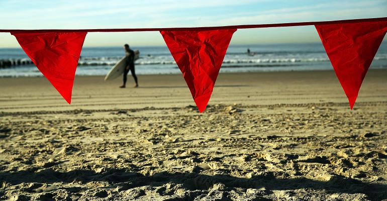red flags on beach