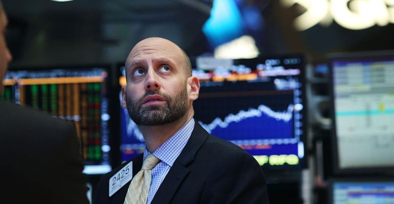 stock market trader looking up