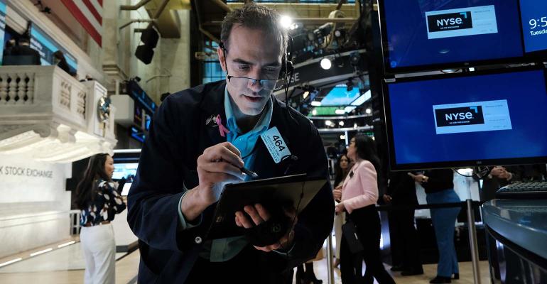 stock-trader-tablet-glasses-nyse.jpg