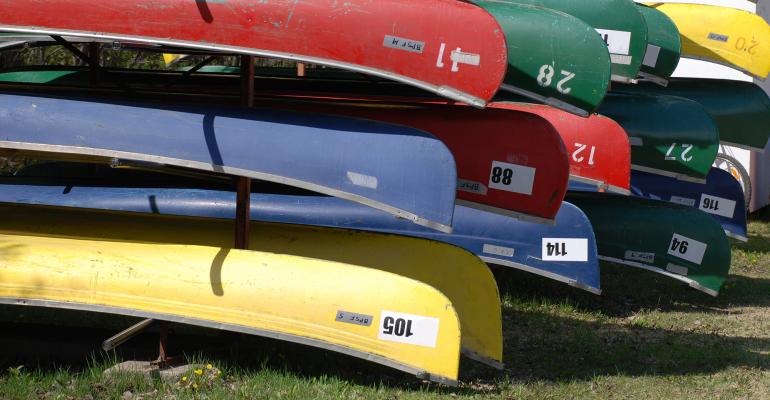 stack of canoes