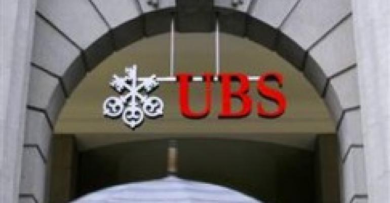 UBS Cuts Costs and Heads, But Hires FAs
