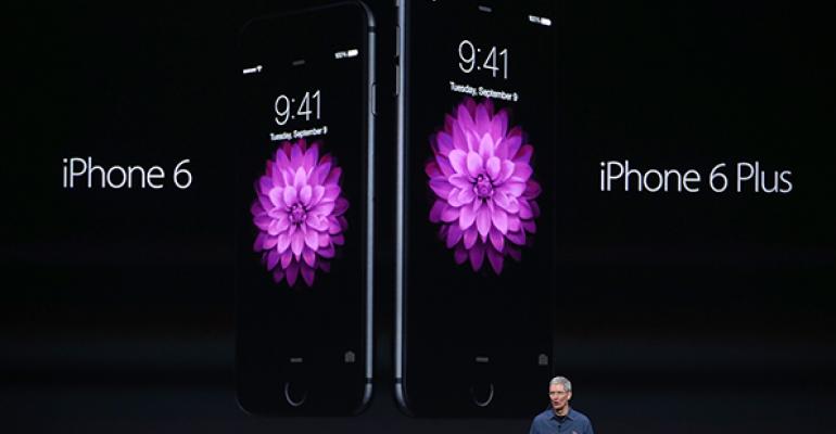 Apple CEO Tim Cook introduces the new iPhone 6 and iPhone 6 Plus on Tuesday