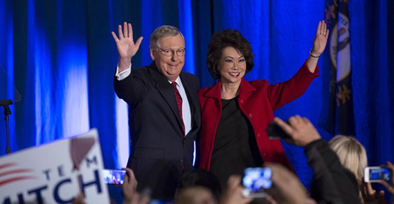 US Sen Mitch McConnell RKY celebrates with his wife Elaine Chao at his election night event on Tuesday