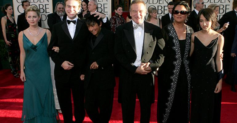  Robin Williams and wife Marsha Garces Williams sons Cody Zachary with girlfriend Alex daughter Zelda at the Golden Globes Awards in 2005