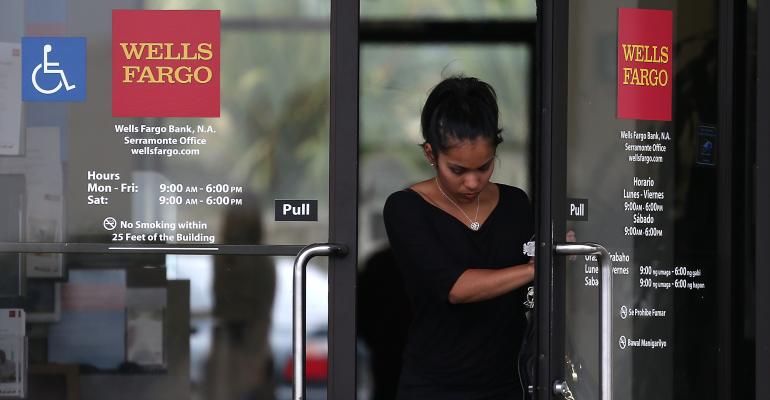 As Regulators Take Aim, Wells Fargo Advisors Say Cross-Selling OK