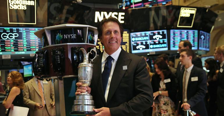 Phil Mickelson brought the Claret Jug to the floor of the New York Stock Exchange after winning the British Open in 2013