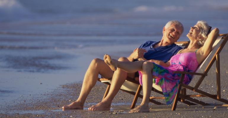 happy retirees beach