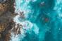 Aerial-view-of-waves-splashing-on-beach_650x450.jpg