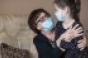 hugging-grandchild-mask-coronavirus.jpg