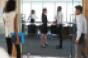 man-woman-handshake-boardroom.jpg